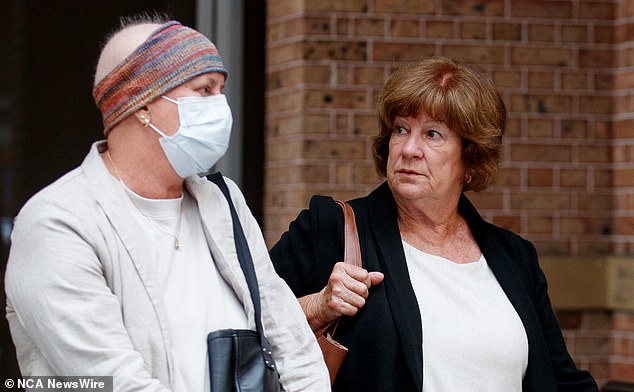 Mrs Nowland's daughter Lesley Lloyd (right) leaves the court after giving evidence.