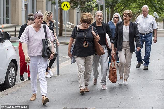 Mrs Lloyd is pictured arriving at court alongside her siblings and supporters on Tuesday.