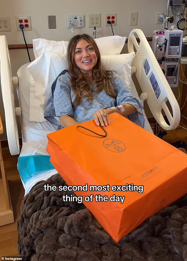 In an Instagram video posted Monday, her husband Jett Puckett filmed her lying in a hospital bed and preparing to give birth when he surprised her with a gift. He gushed about his wife as she was seen unwrapping the instantly recognizable bright orange box to reveal an Hermès Kelly bag estimated to cost more than $30,000.