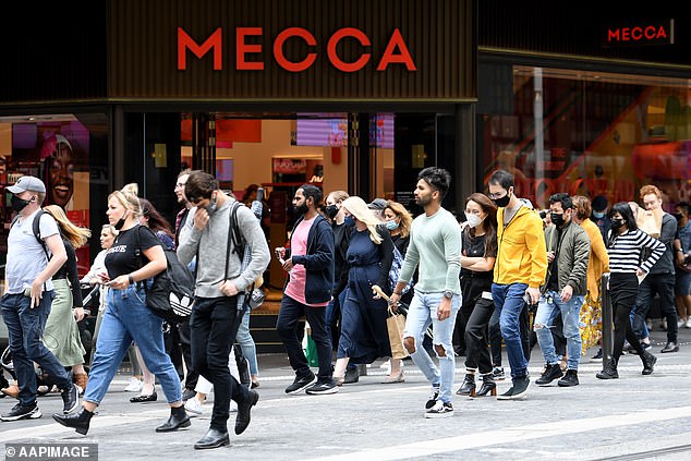 An increasing number of Australians are thinking twice about spending money on Christmas gifts this year, as the cost of living crisis continues to bite (pictured, shoppers in Sydney).