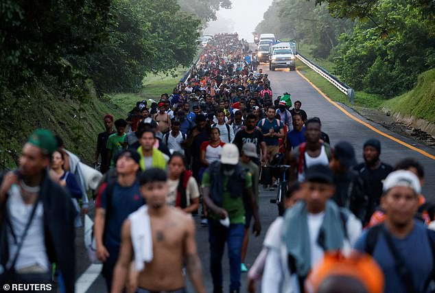 A caravan is seen traveling through Mexico towards the US on November 7