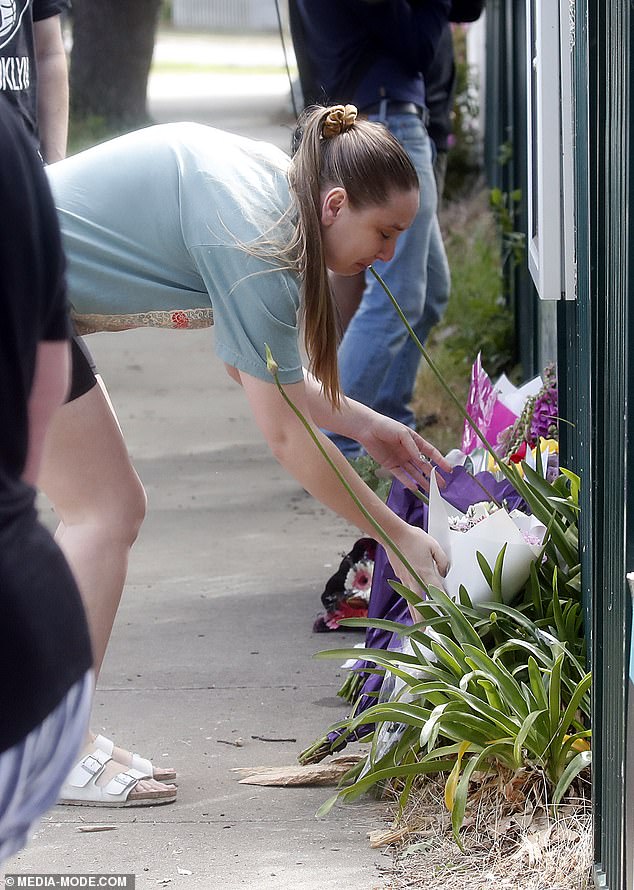 Heartbroken locals continue to leave flowers at the site of the tragedy.