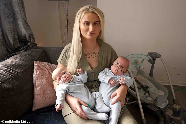 Mrs Morris pictured with her twin sons Aaron-Junior John Robson Morris (left) and Ambrose-Ayren Morris (right)