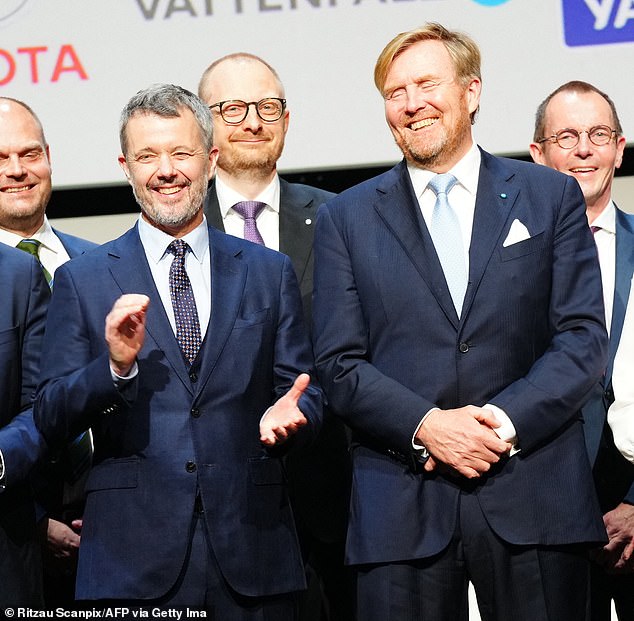 King Willem-Alexander of the Netherlands and King Frederik of Denmark pose for a photograph at Danish Industry (DI) in Copenhagen.