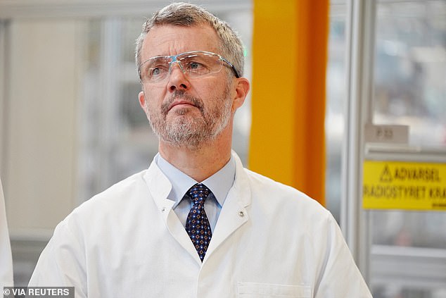 King Frederick donned protective glasses and a lab coat during the visit.