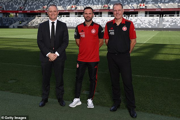 There was much fanfare surrounding the arrival of Mata (centre) to the club and Stajcic (right) praised the midfielder's work rate.