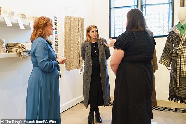 Pictured: Princess Beatrice speaking to students of the Future Textiles programme. The royal wore a stylish gray winter coat for the event.