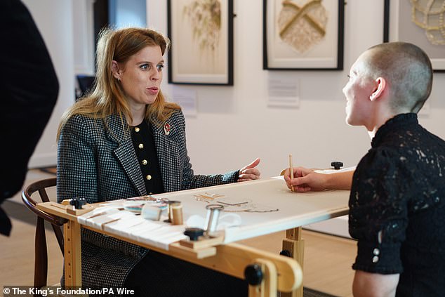 Pictured: Princess Beatrice takes part in an embroidery demonstration with student Rosie at The King's Foundation's Future Textiles exhibition on Tuesday 12 November.