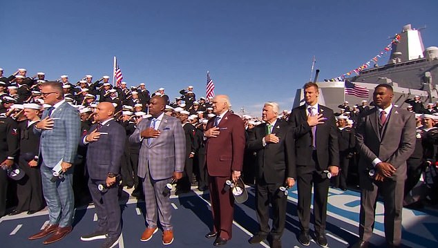 Strahan (right) has been criticized for not placing his hand over his heart during the anthem.