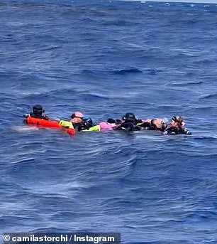 They found five divers, all clinging to each other to stay afloat, and one who was in the throes of hypothermia after they accidentally became separated from their tour boat.