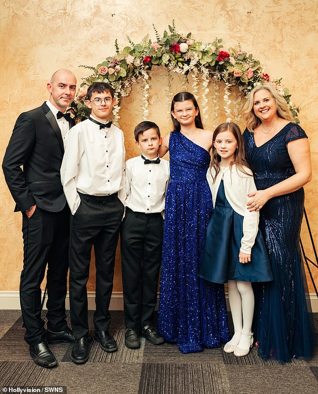 Father Andrew, brother Harry, brother Jack, Audrey, sister Emily and mother Tracey Tyrrell pose for a family portrait.