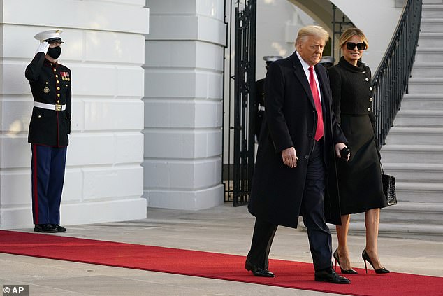 President Donald Trump and first lady Melania Trump walk to board Marine One on the South Lawn of the White House in January 2021.