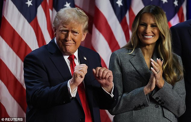 Republican presidential candidate and former US president Donald Trump dances accompanied by Melania Trump