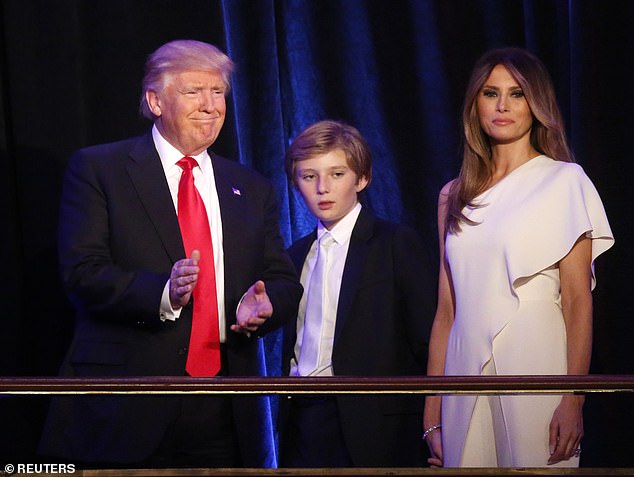 US Republican President-elect Donald Trump with his son Barron (C) and his wife Melania at his election night rally in Manhattan, New York, United States, on November 9, 2016.