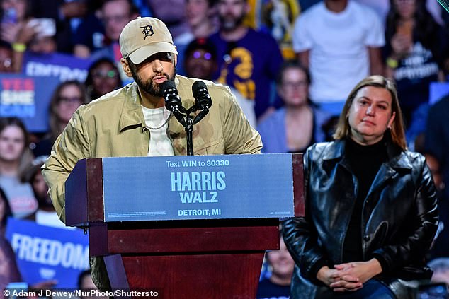 Rapper Eminem (left), whose real name is Marshall Mathers, appeared at a Harris-Walz campaign event in Detroit, Michigan, on October 22, alongside former President Barack Obama and Senator-elect Elissa Slotkin (right).