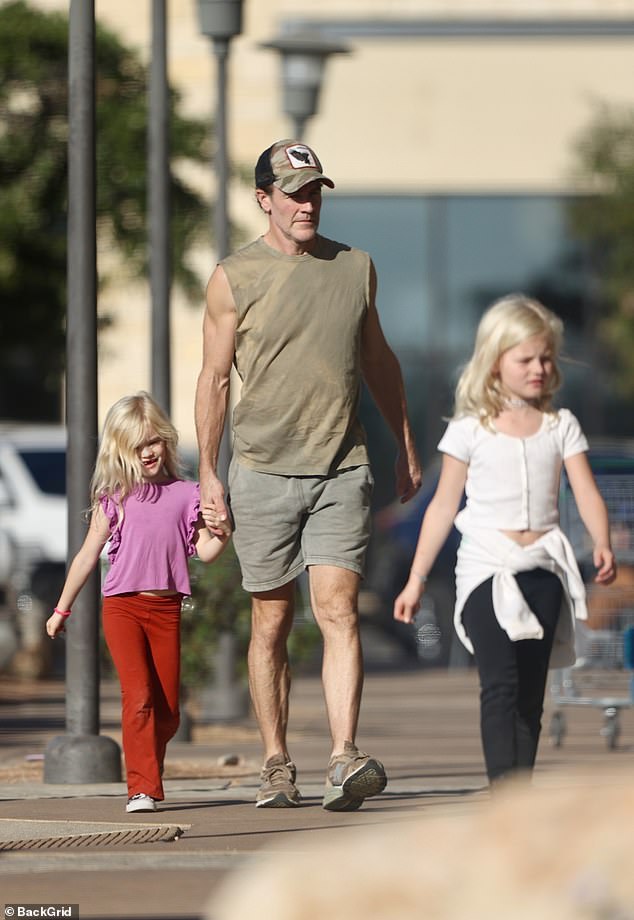 The actor appeared to be approaching the grocery store.