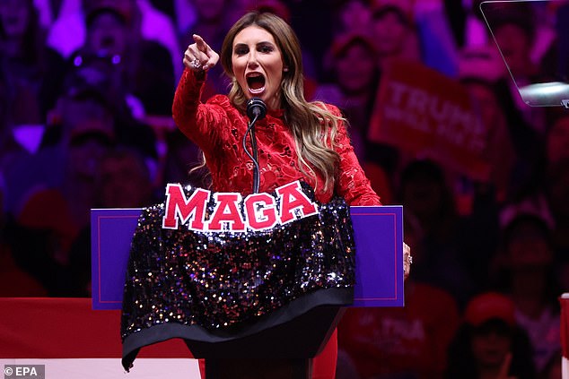 Known as the attack dog of the Trump campaign, Habba quickly became its most vocal defender. In the photo: Habba places his MAGA jacket on the podium at Madison Square Garden.