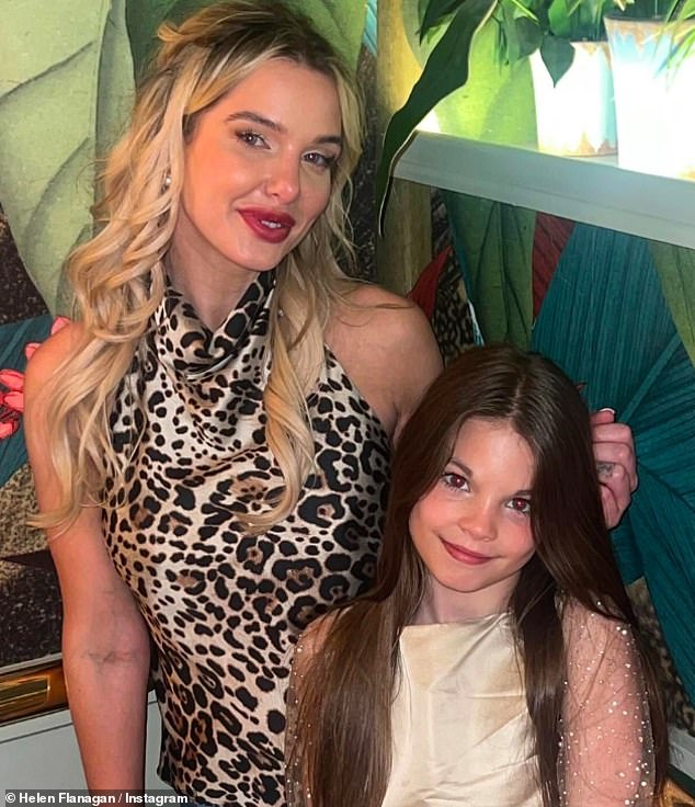 The Celebs Go Dating star, 34, looked happier than ever as she hugged her stylish partner, 45, and posed with their daughter.