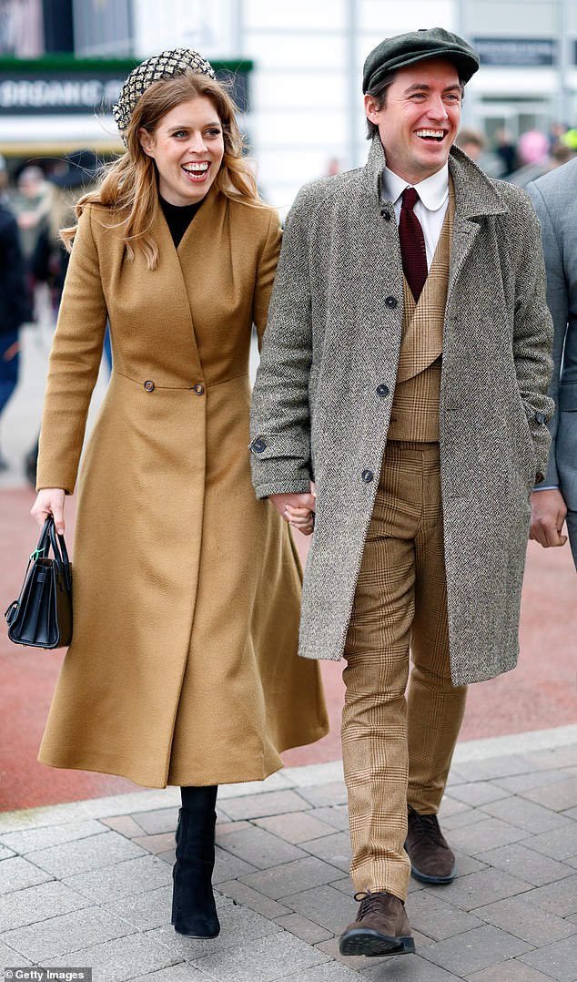 Fresh in camel, Princess Beatrice and Edo coordinated in chic neutral tones at Cheltenham Racecourse earlier this year.