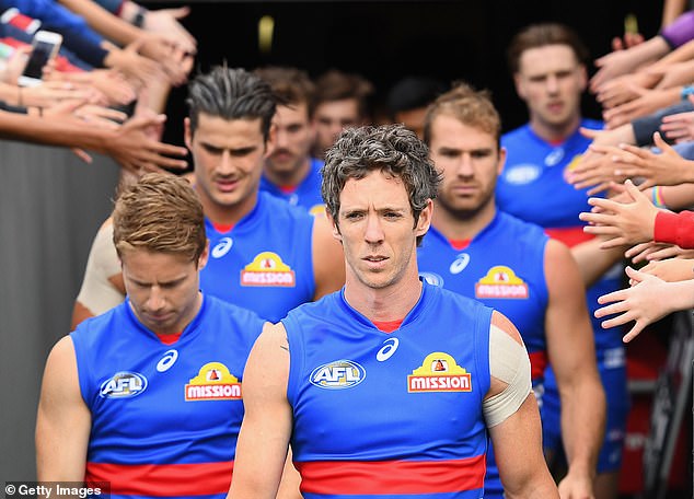 Vella will take over ABC Radio's breakfast show in Melbourne alongside co-host and former Western Bulldogs captain Bob Murphy (pictured).