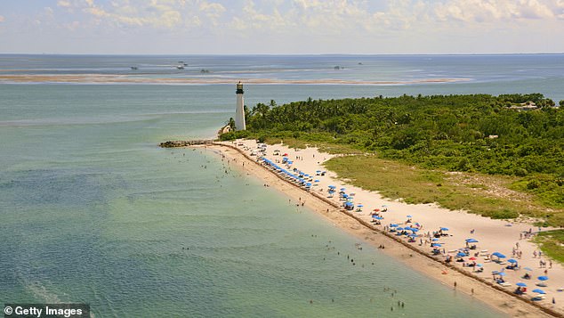 Key Biscayne, located on a barrier island off the Rickenbacker Causeway from Miami, is described as 