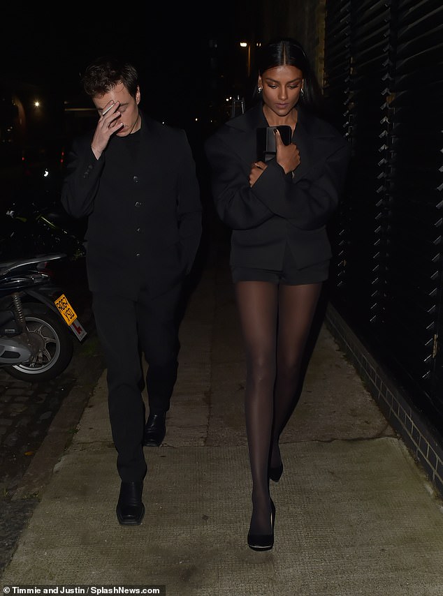 Simone, who posed for the calendar, showed off her long legs in tiny shorts, teamed with stockings and stilettos as she left the restaurant with a friend.