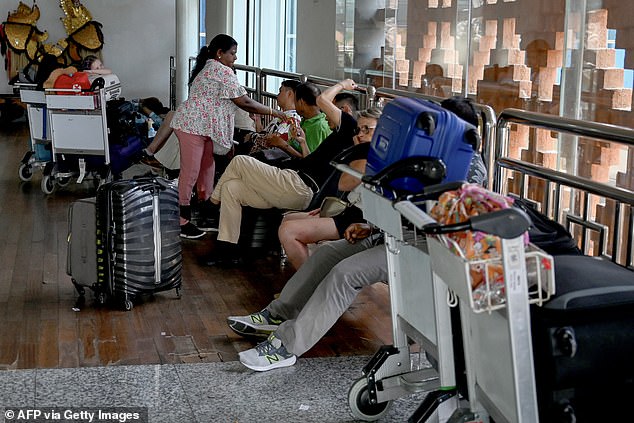 Stranded travelers are unable to fly out of the resort island of Bali and others are unable to return to Australia due to mass flight cancellations caused by the eruption of Mount Lewotobi Laki-laki.