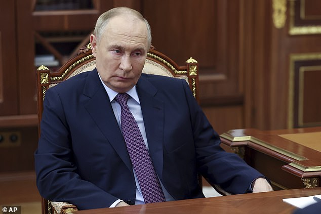 Vladimir Putin photographed in the Kremlin on November 12 during a meeting