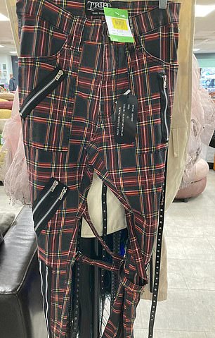 Among the items for sale were tartan pants adorned with zippers.