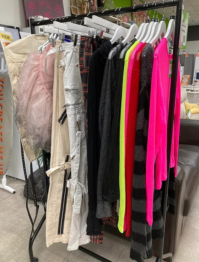 Shoppers spotted the brightly colored stage clothes along with a note saying they had been donated to the Salford charity shop.