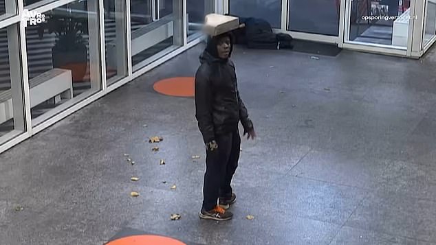 A man believed to be Levis E. is seen balancing a concrete block above his head before launching an attack.