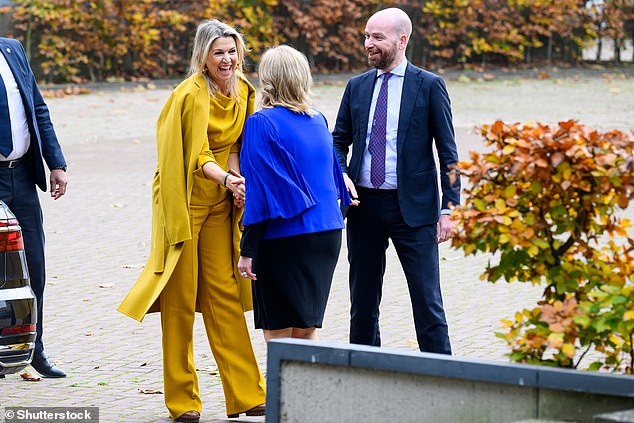 The Dutch royal, 53, opted for a canary yellow ensemble, which included a roll-neck top, wide-leg pants and a matching coat.