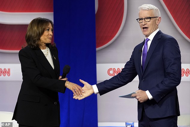 Stars like Anderson Cooper, seen during CNN's town hall with Kamala Harris in October, could see their multimillion-dollar salaries hit as staff fear the cuts could affect all levels of the network.