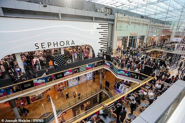 Photos from the mall showed crowds filling the surrounding storefront, with devoted makeup and skincare experts at the ready.