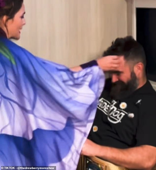 Drew Barrymore sprinkled flower petals on Jason Kelce backstage at WrestleMania 40