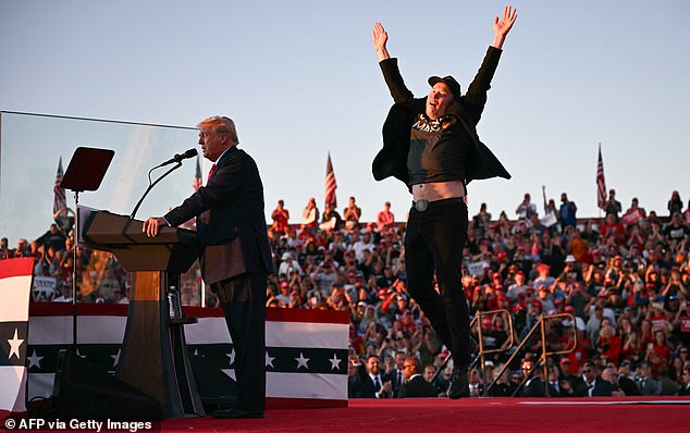 Musk jumps on stage as Trump speaks at a campaign rally in Butler, Pennsylvania, on October 5.