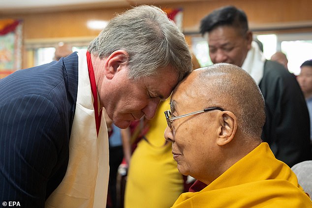 McCaul during a meeting with the Dalai Lama (R) at his residence in Dharamsala, Himachal Pradesh state, India, in June 2024.