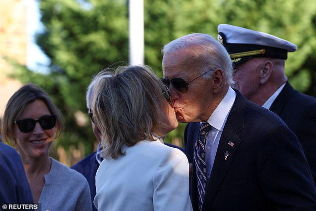 It's not as painful as Biden appearing to kiss his sister Valerie... on the mouth! – at a Veterans Day ceremony honoring his late son Beau. Oh!