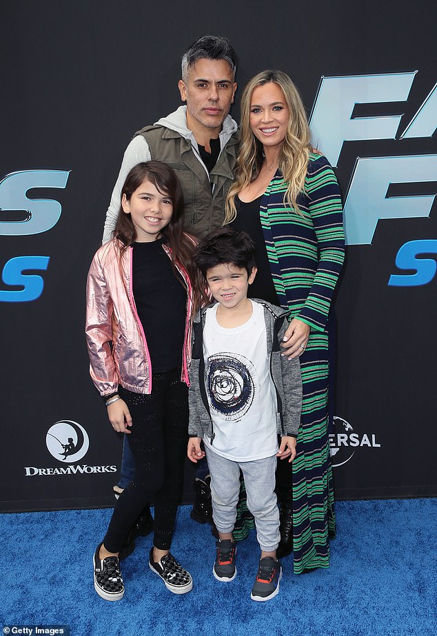 The former couple shares three children: Slate, 12, Cruz, 10, and Dove, 4; seen in 2019 with his two oldest children