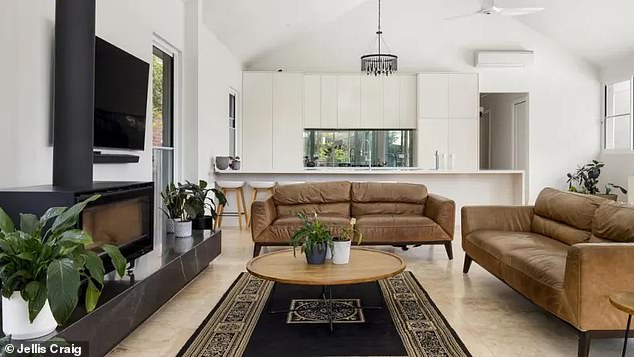 The house also features a large open-plan living and dining room, which agent Matthew Treacy told the Herald Sun was the main draw for the producer.