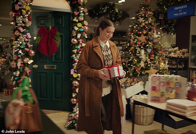 The heartwarming commercial takes viewers on a magical journey that follows a sister's (pictured) emotional search for the perfect Christmas gift.