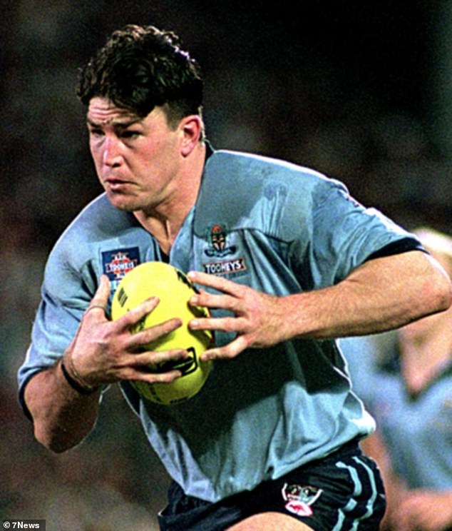 Carroll (pictured playing for NSW), one of the toughest players to ever take the field, is doing everything he can to improve his mental health.