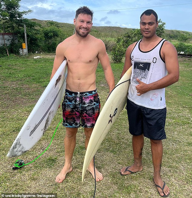 Greene (pictured left during a previous holiday in Fiji) was rescued by a man on a jet ski who told him he had never seen anyone on the break so close to death.