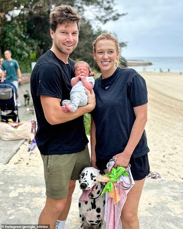 The GWS Giants skipper (pictured with Stirton and his daughter Isla) confessed he almost died because he made an arrogant decision about how to paddle into the waves.