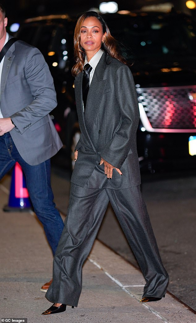 Saldana flaunted a short, shiny black manicure while heading to the Late Show with Stephen Colbert.