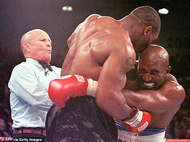 Tyson was disqualified for biting off a piece of Holyfield's ear in their 1997 rematch.