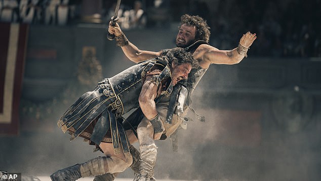 And Denzel wasn't alone, as the 86-year-old filmmaker also featured a same-sex kiss between Roman general Marcus Acacius (L, Pedro Pascal) and gladiator Lucius Verus (R, Paul Mescal).