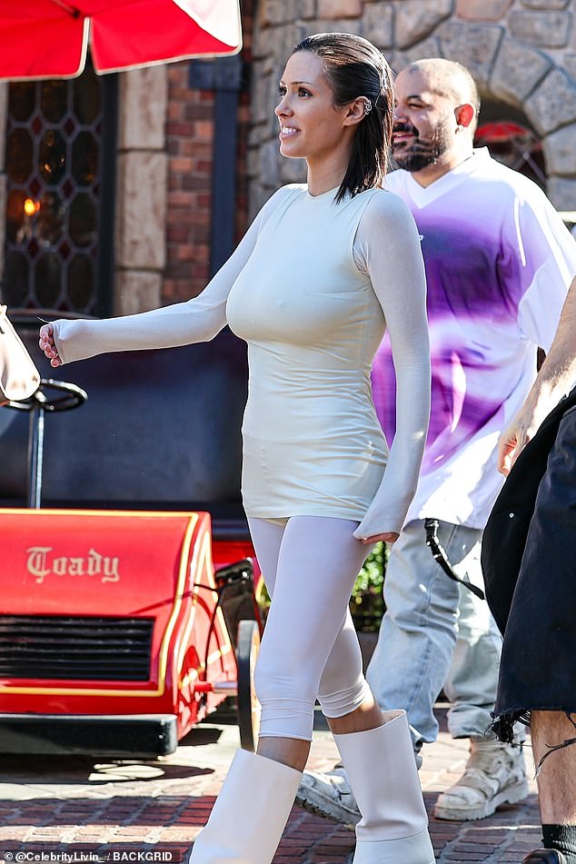 Bianca, who surprised Disney fans in April when she went barefoot to visit the park with Kanye, was surprisingly covered up when she arrived at the park in Anaheim, California, even though she appeared to be going braless.