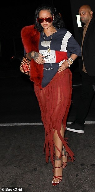 Rihanna was dropped off outside The Nice Guy, a trendy Italian restaurant frequented by the Kardashian-Jenner clan, in a chauffeur-driven black SUV.