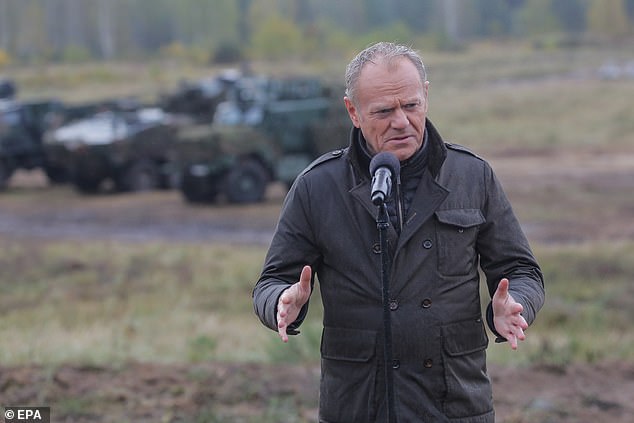 Tusk speaks during a press conference at the military exercise defense program 